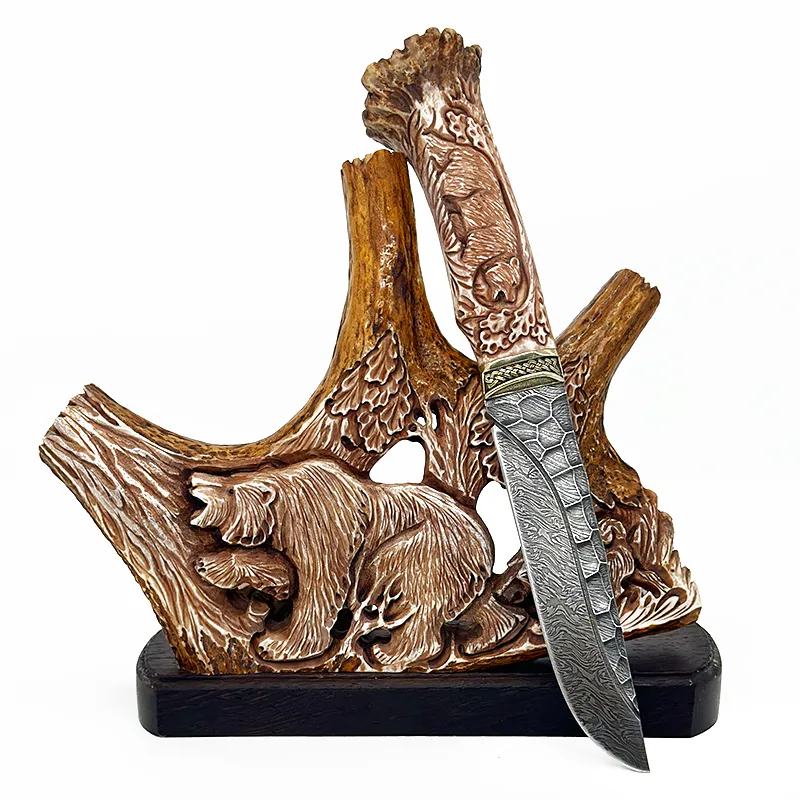 Нож из дамасской стали на подставке из кости "Медведь"